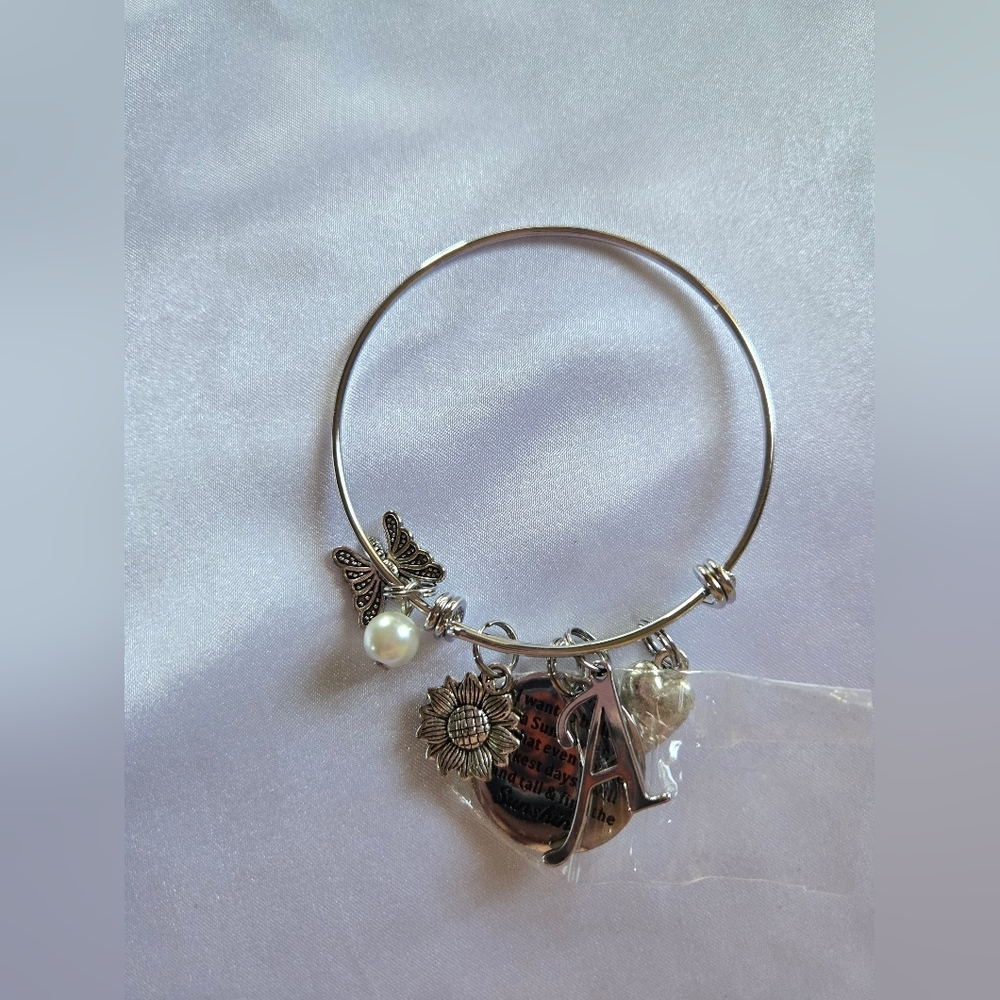 Silver Bracelet with Butterfly and Sunflower Charms